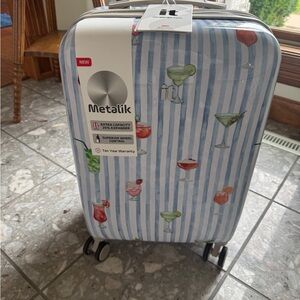 IT METALIK  “PARTY COCKTAILS” BLUE STRIPED HARDSIDE MEDIUM ROLLER LUGGAGE